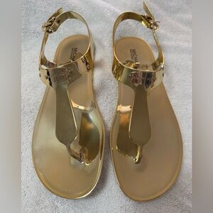 Michael Kors sandals. 
Gold color size 9